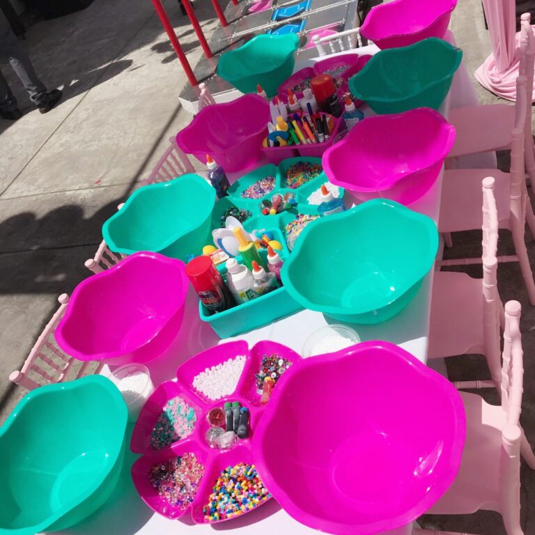 A table set up with bowls of different colors.